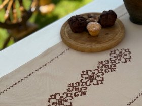 Table runner made of water-repellent fabric 45x170 DUCK Beige with brown embroidery